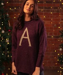 Harry Potterš
Christmas Shop 38 Warner Bros 'A' Weasley Knitted Jumper Weasley Knitted Jumpers