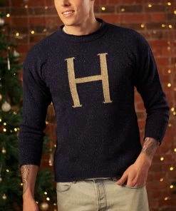 Harry Potterš
Christmas Shop 54 Warner Bros 'H' Weasley Knitted Jumper
